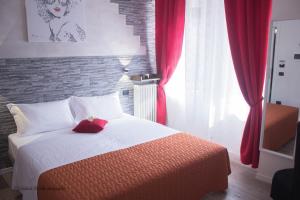 Postel nebo postele na pokoji v ubytování Aurelia Rooms