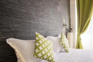 Postel nebo postele na pokoji v ubytování Aurelia Rooms