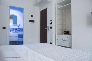 Postel nebo postele na pokoji v ubytování Aurelia Rooms