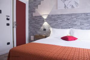 Postel nebo postele na pokoji v ubytování Aurelia Rooms
