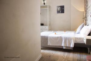Postel nebo postele na pokoji v ubytování Aurelia Rooms