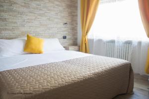 Postel nebo postele na pokoji v ubytování Aurelia Rooms