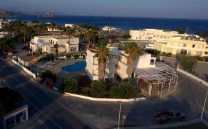 an aerial view of a city with houses and a street at Antonis Hotel in Kefalos