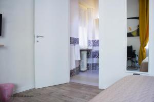 Postel nebo postele na pokoji v ubytování Aurelia Rooms