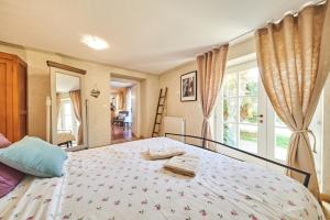 a bedroom with a bed and a large window at Villa Rea in Umag +33 photos