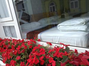 Postel nebo postele na pokoji v ubytování Mr Rot's Secret Hotel