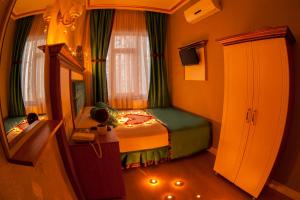 Cama o camas de una habitación en Hurriyet Hotel