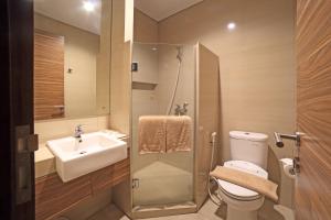 Kupatilo u objektu Rasuna Icon Hotel