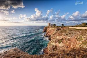 a view of the ocean from a cliff at Miss Sicily B&B in Terrasini