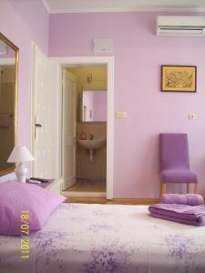 Posteľ alebo postele v izbe v ubytovaní Devivi Apartments