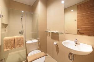 Kupatilo u objektu Rasuna Icon Hotel