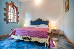 A bed or beds in a room at C'era una volta