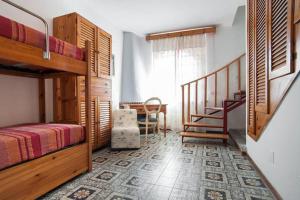 Postel nebo postele na pokoji v ubytování C'era una volta