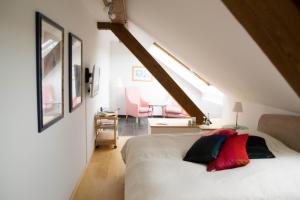 
Ein Bett oder Betten in einem Zimmer der Unterkunft Hotel Restaurant Vinothek LAMM
