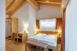 Postel nebo postele na pokoji v ubytování Hotel Phoenix