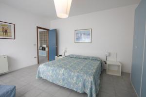 Postel nebo postele na pokoji v ubytování Grand Hotel Golf