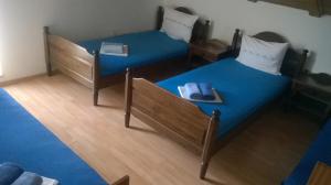 En eller flere senge i et værelse på Apartments Jaksa