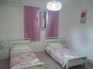 Posteľ alebo postele v izbe v ubytovaní Summer Bay Apartments