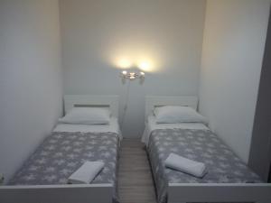 Posteľ alebo postele v izbe v ubytovaní Summer Bay Apartments