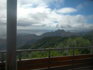 a view of the mountains from a balcony at Albergue Montes de Anaga in El Bailadero