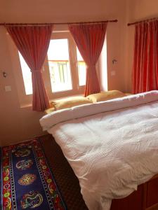 Postelja oz. postelje v sobi nastanitve Hotel Khangri
