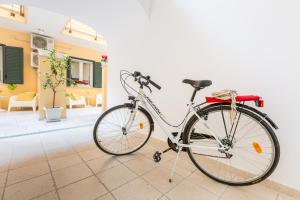 a bike is parked in a room at Isola Blu in Taranto