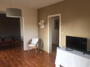 TV a/nebo společenská místnost v ubytování Appartement Orana