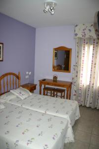 Postel nebo postele na pokoji v ubytování Casa Raspa
