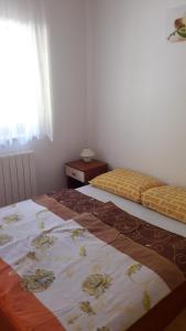 Postel nebo postele na pokoji v ubytování Apartments Tea