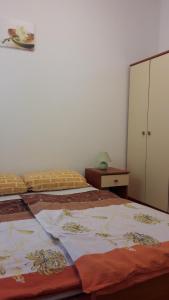 Postel nebo postele na pokoji v ubytování Apartments Tea