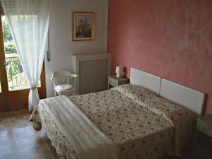 Posteľ alebo postele v izbe v ubytovaní Casa Palmira