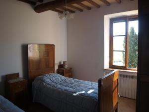 A bed or beds in a room at Santa Margherita