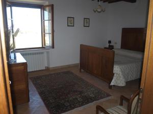 A bed or beds in a room at Santa Margherita