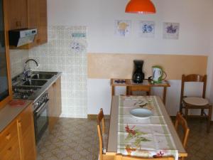 Kuchyňa alebo kuchynka v ubytovaní Casa Palmira