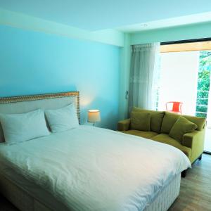 Postel nebo postele na pokoji v ubytování Spring Land Villa & 白舍青丘
