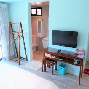 TV a/nebo společenská místnost v ubytování Spring Land Villa & 白舍青丘