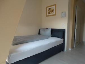 Postelja oz. postelje v sobi nastanitve Hotel Amy