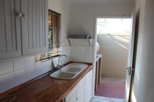 Η κουζίνα ή μικρή κουζίνα στο Klipkopje Guest Cottage +38 φωτογραφίες