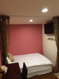 Katil atau katil-katil dalam bilik di Share B&B