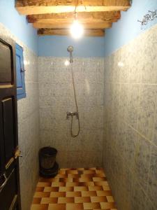 Ett badrum på Auberge Tigida