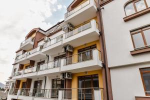 an image of a building with balconies at Stela Apartments in Obzor