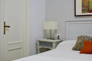 Posteľ alebo postele v izbe v ubytovaní Apartamento Mar de Korus