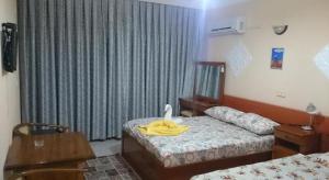 Postel nebo postele na pokoji v ubytování Hotel Grün