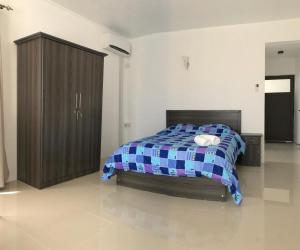 Postel nebo postele na pokoji v ubytování Luxe Exotica Apartments