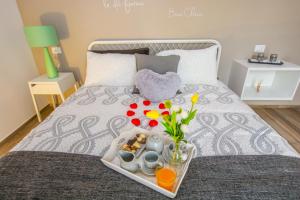 A bed or beds in a room at Dimora Antica Via MiLord