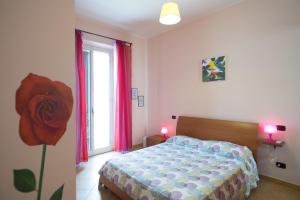 Postel nebo postele na pokoji v ubytování Bed and breakfast MieleZenzero