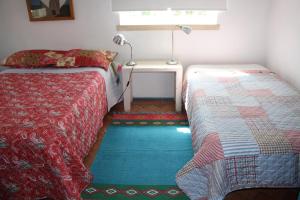 Katil atau katil-katil dalam bilik di Quinta das Tamengas