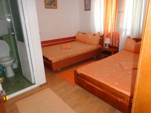Postel nebo postele na pokoji v ubytování Casa Munteanu