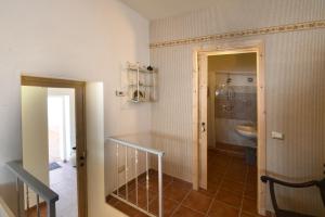 a bathroom with a sink and a toilet in a room at Borgo dei Pescatori Lecco in Lecco