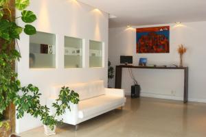 Uma TV ou centro de entretenimento em Hotel San Martin